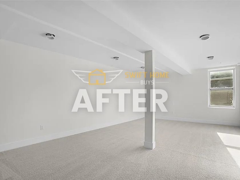 St. Charles basement after renovation: fresh paint and new carpet