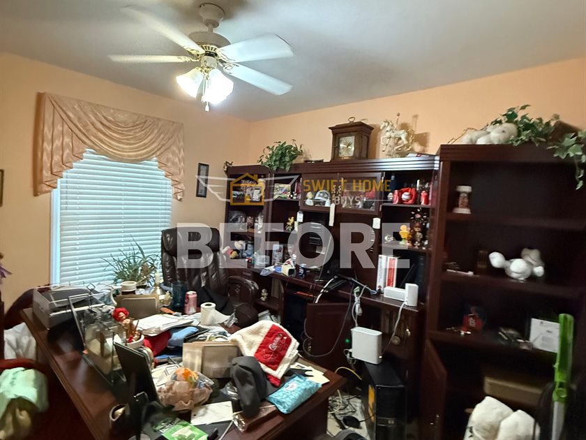 St. Charles bedroom before: used as a cluttered home office