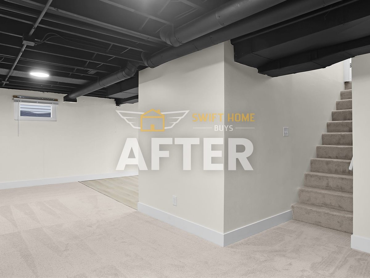 St. Louis County basement after renovation: finished walls, new carpet and a painted open ceiling