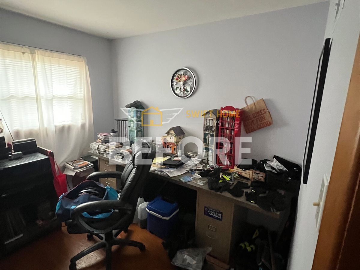 St. Louis County bedroom before: used as a cluttered home office